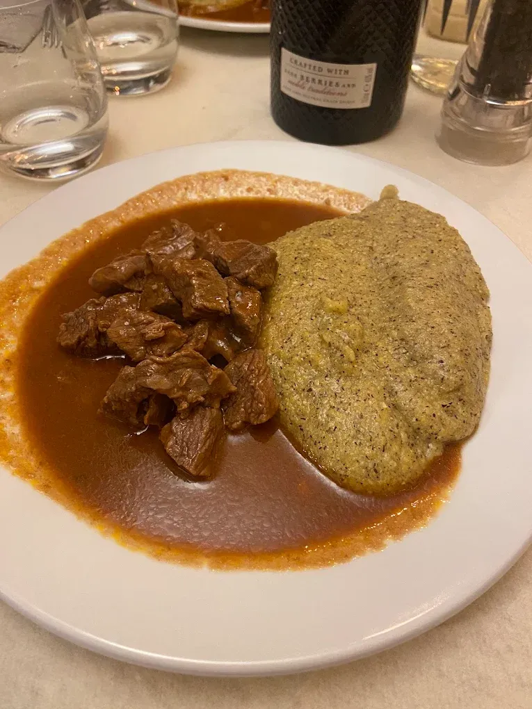Cena in baita con trasporto in motoslitta a Madesimo