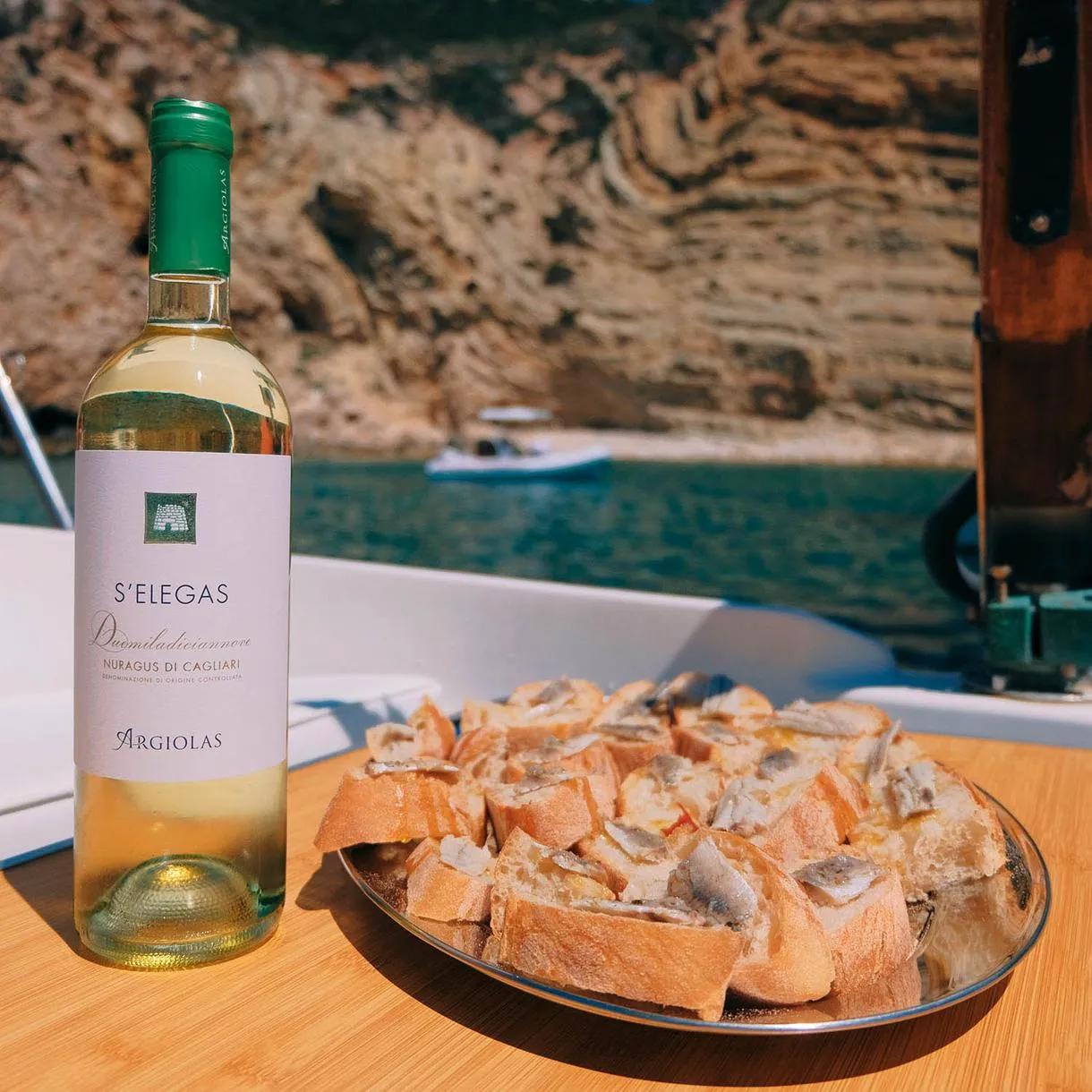 Giro in barca a vela al tramonto con aperitivo ad Alghero