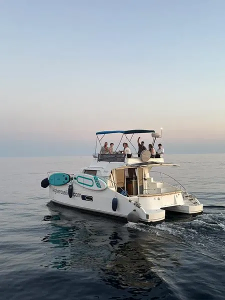 Escursione in gozzo al tramonto ad Alghero con aperitivo a bordo