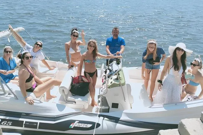 Group boat excursion with dolphin spotting and snorkeling from Olbia