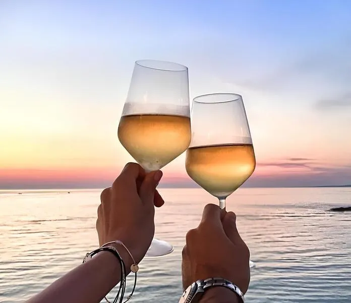 Gozzo trip in the Bay of Taormina from Giardini di Naxos at sunset