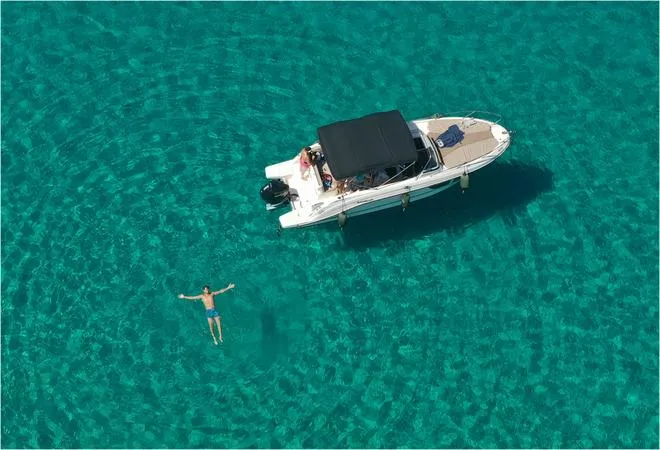 Escursione in barca ad Alghero di mezza giornata con aperitivo