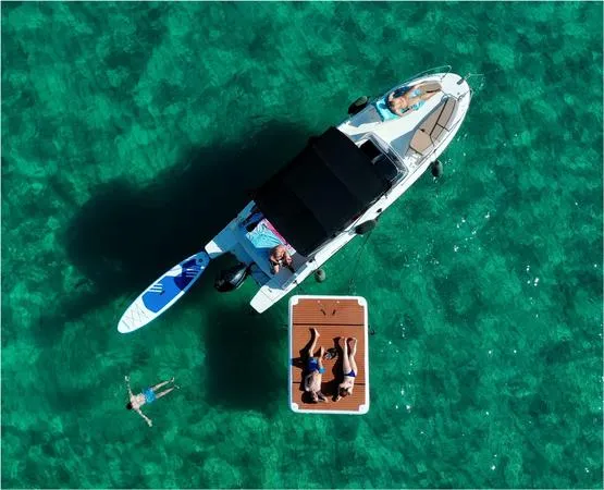 Escursione in barca ad Alghero di mezza giornata con aperitivo