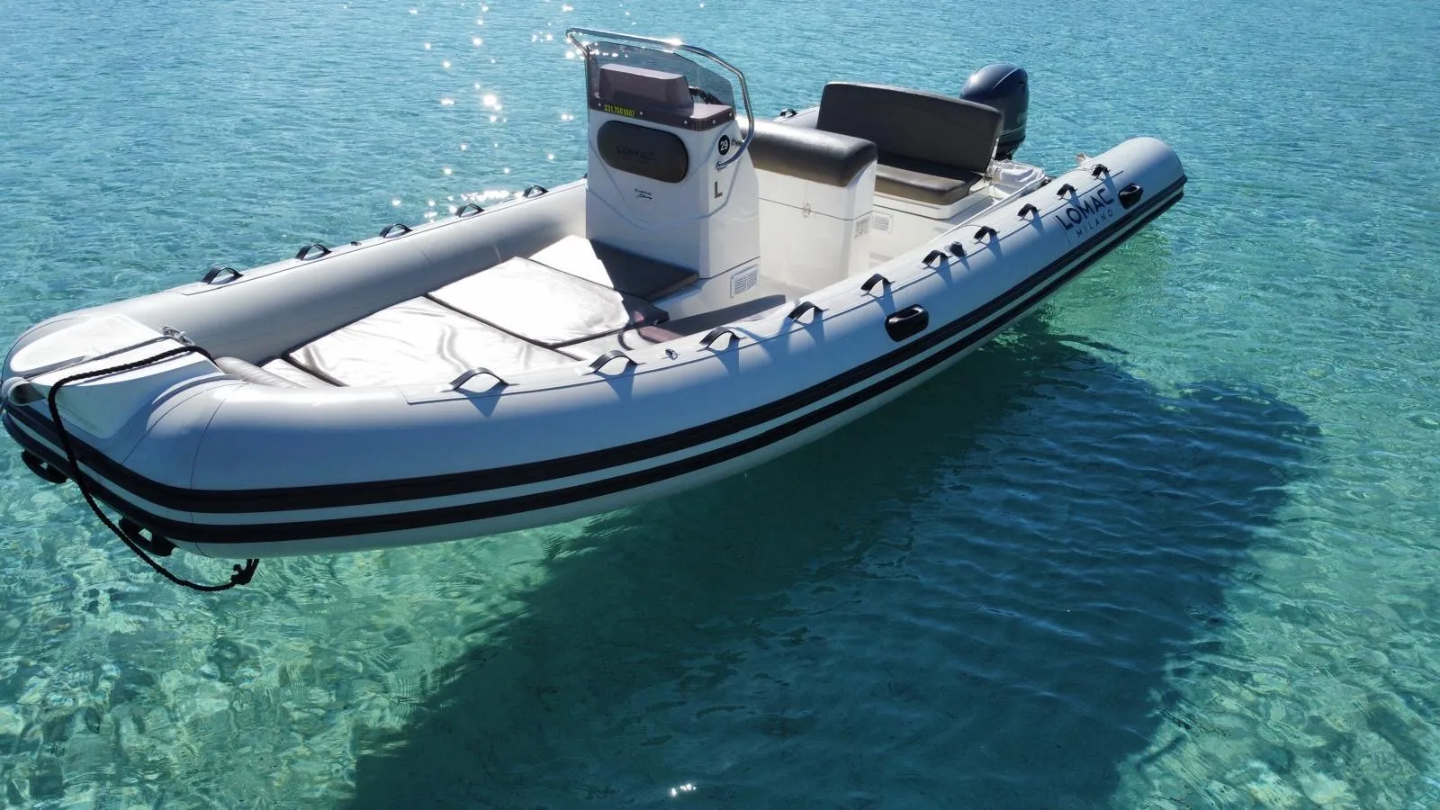 Rent an inflatable boat without a license for 8 people in La Maddalena