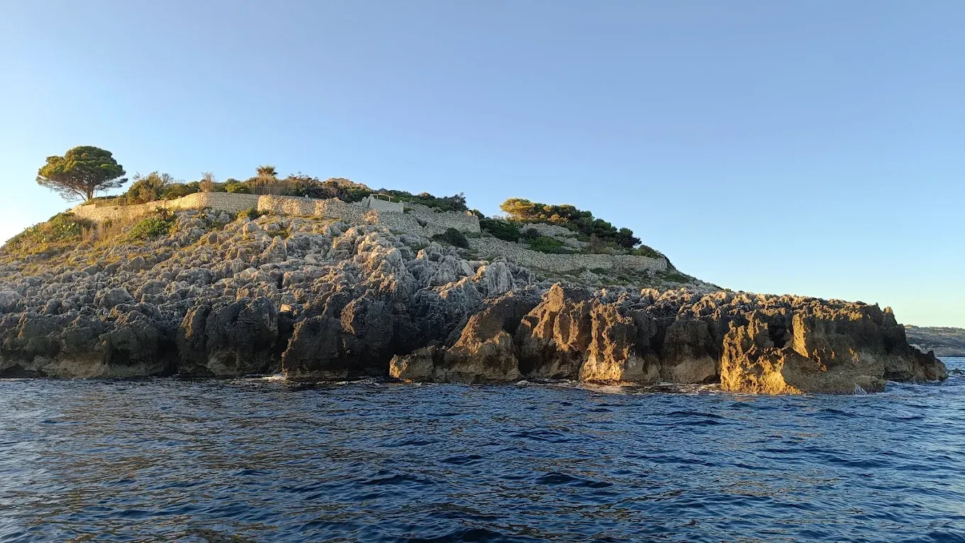 Aperitivo al tramonto in barca a Castro