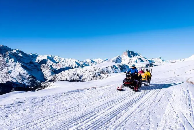 Giro in motoslitta e discesa in slittino alle Tre Cime di Lavaredo