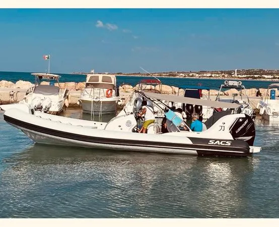 Boat Tour from Torre Vado to Leuca caves and snorkeling